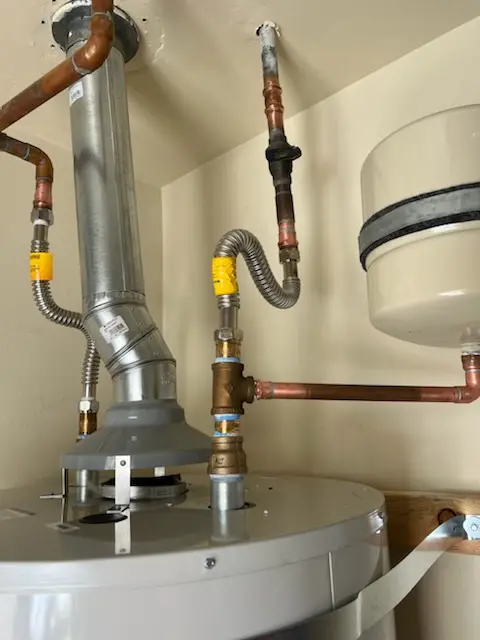Water heater installation and plumbing repair in Woodlawn