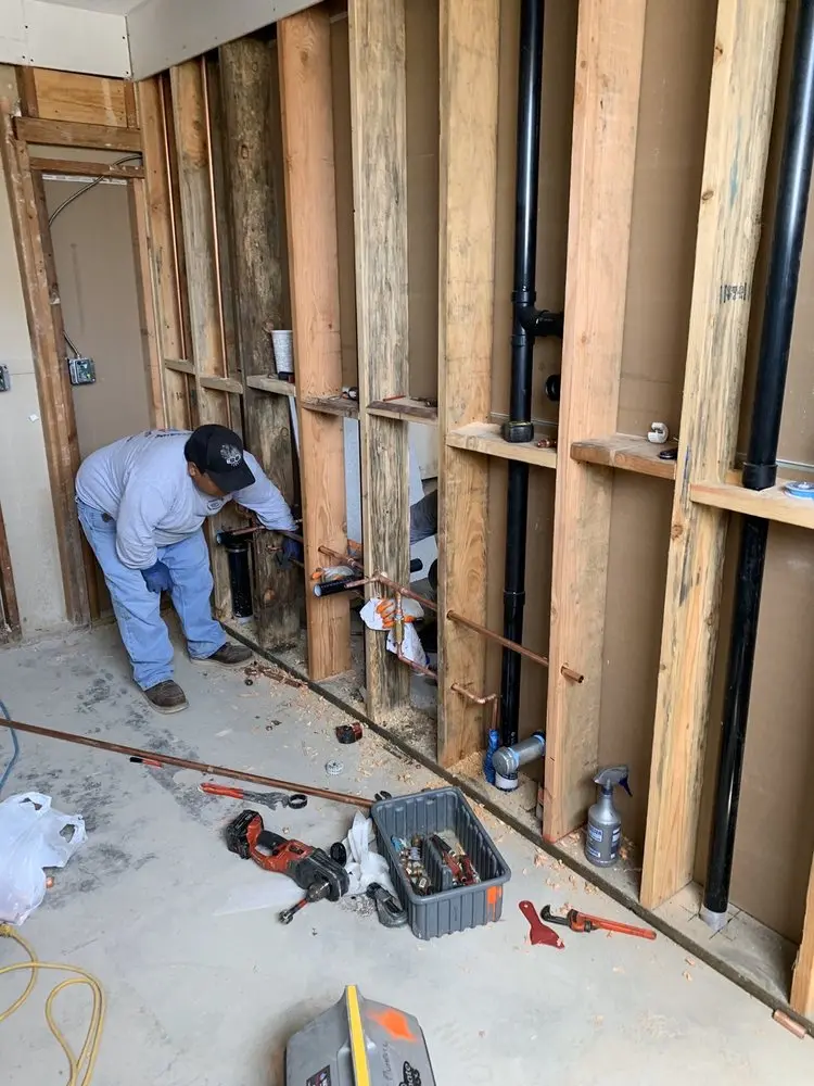 Commercial rough-in plumbing for Water Heater Replacement in Woodlawn